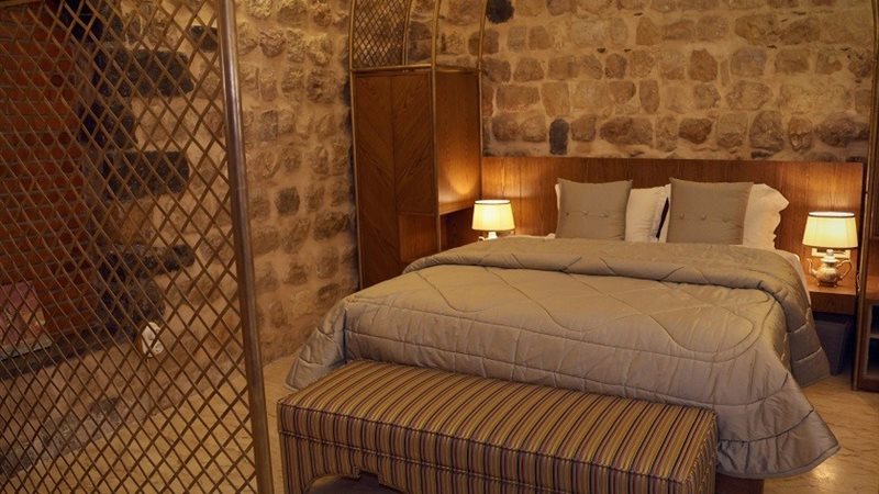 A vaulted guest room